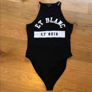 Really cute high neck, open back bodysuit!